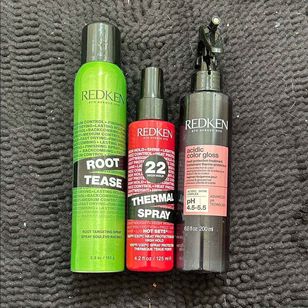 Redken Styling Trio: Green, Red, and Black Bottles